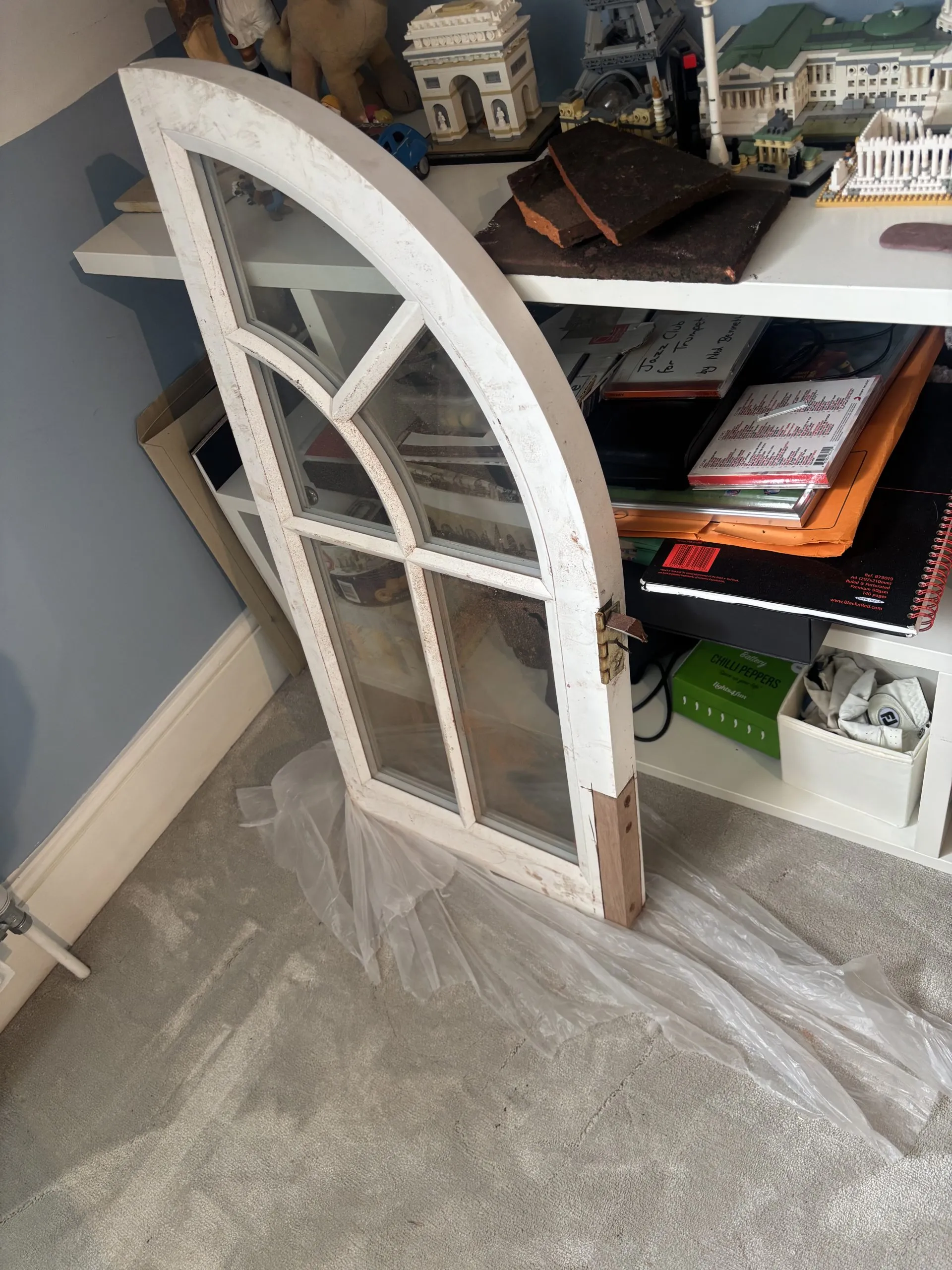 Damaged timber window frame before repair